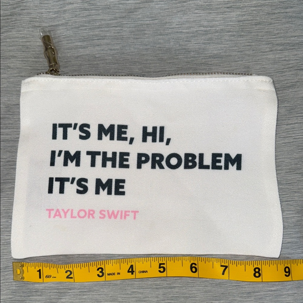 NEW Taylor Swift White Pouch with Black and Pink Text. Bamboo gold hardware